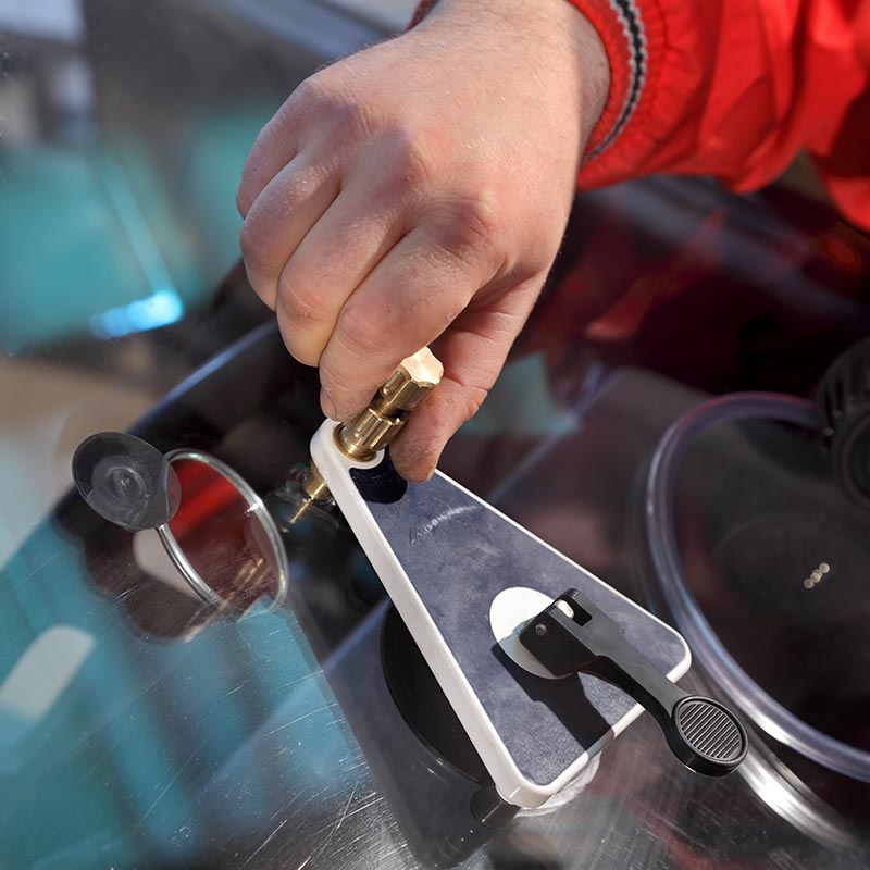 Carefree Windshield Repair technician performing a rock chip repair in Colorado Springs